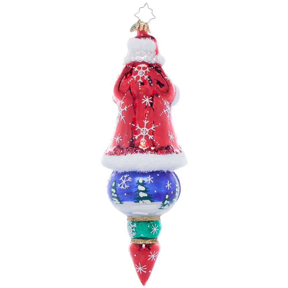 Santa’s Splendid Snowscape glass ornament featuring a red coat Santa atop a blue winter scene ball.
