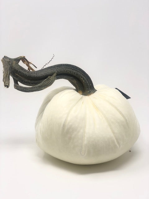 Handmade velvet pumpkin in deep orange with a natural stem.