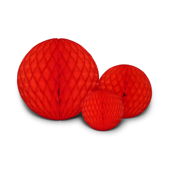 Three bright honeycomb paper balls in a trio set with geometric faceted silhouettes.