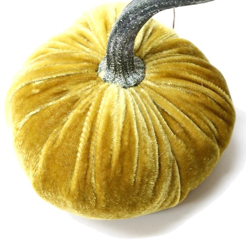 Handmade orange velvet pumpkin with a natural stem.