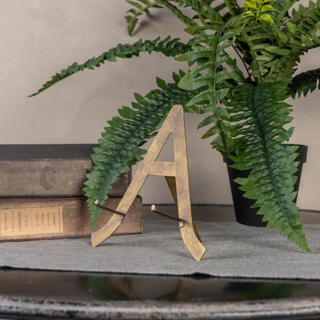 Bronze metal plate stand with dimensions L:6.5in W:2.5in H:7.25in