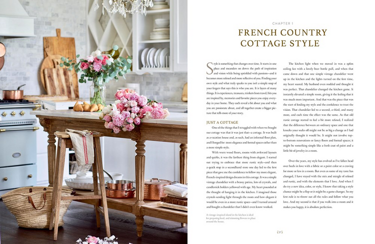 Open book titled French Country Cottage Style showing a rustic kitchen island with pink flowers.