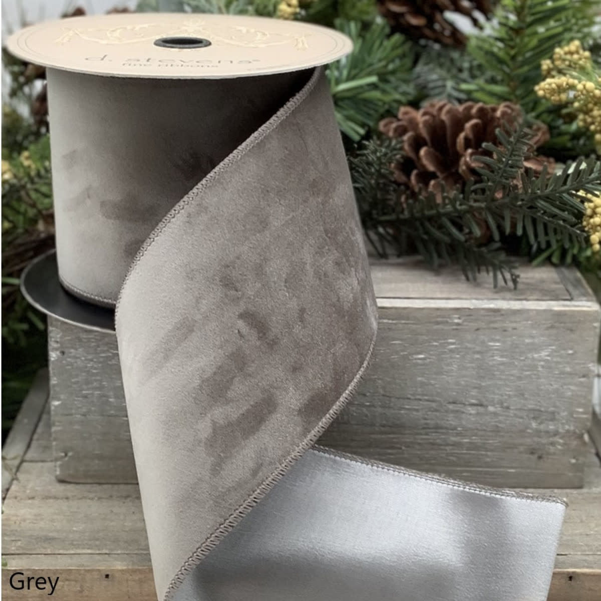Grey velvet taffeta fabric roll measuring four inches wide by ten yards long.