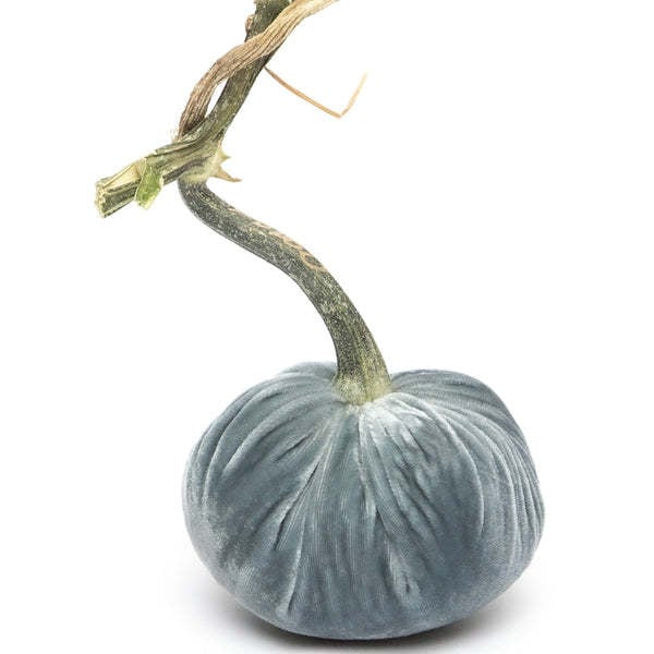 Handmade 8-inch velvet pumpkin in deep orange with a natural stem.