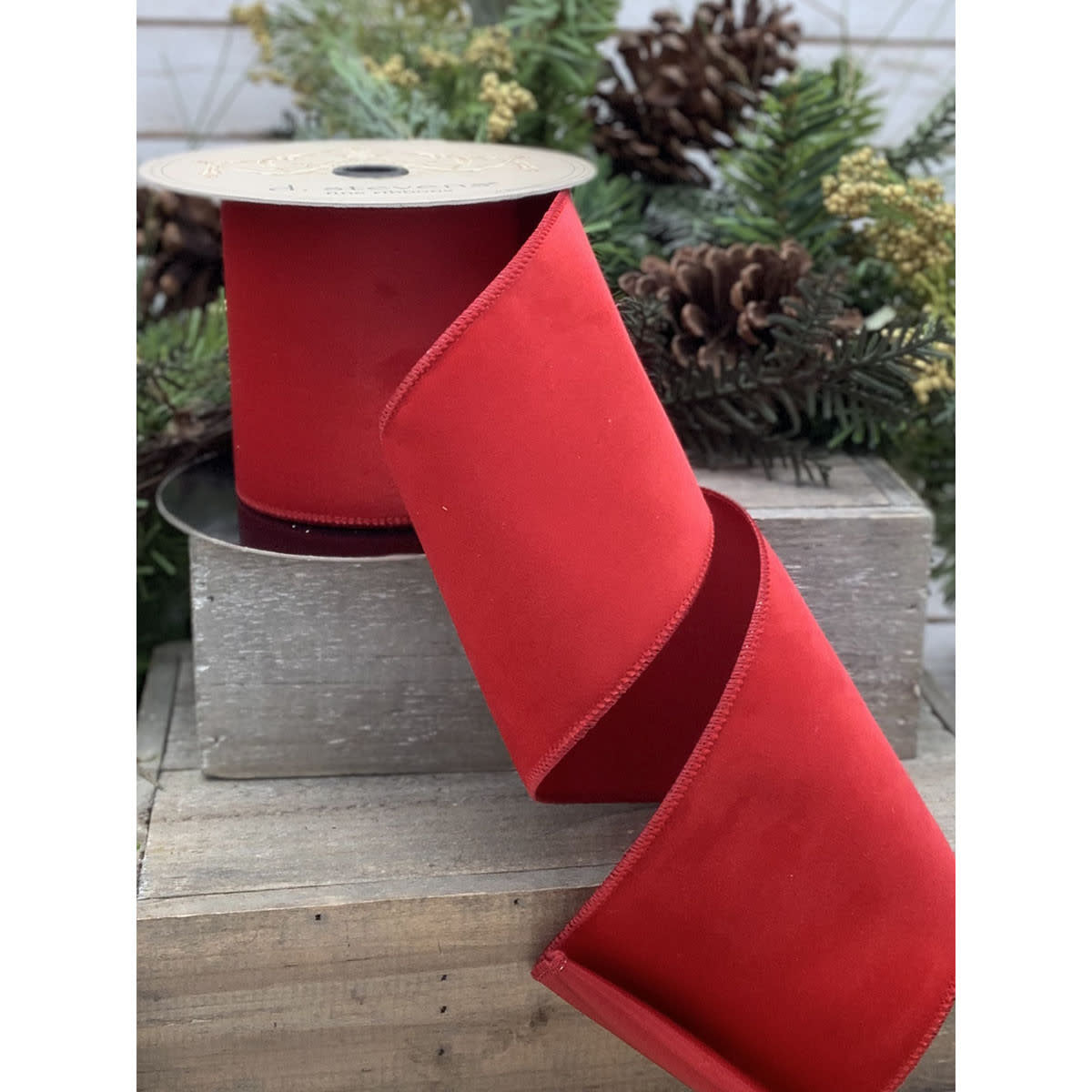 Red velvet taffeta ribbon roll with a smooth sheen finish