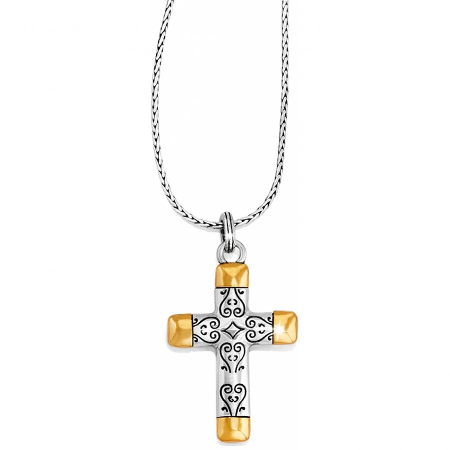 Reversible cross necklace with silver-gold mixed metal finish featuring Venetian mask motif and lobster claw closure.