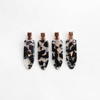 Recycled eco-friendly creaseless hair clips in natural tone with secure grip.
