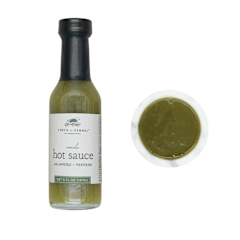 Bottle of Verde Hot Sauce with green liquid inside