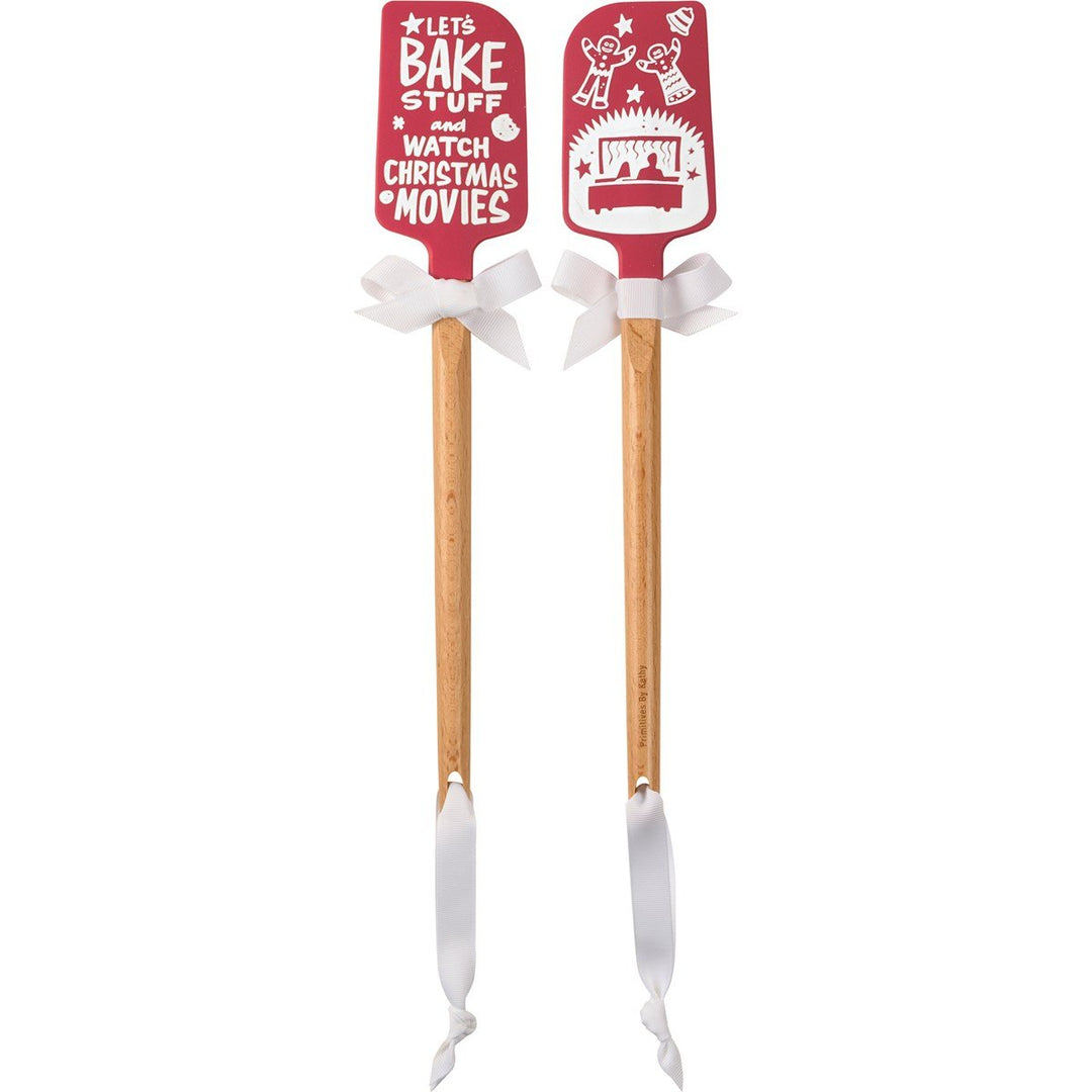 Wood-handled silicone spatula with red Christmas-themed blade.