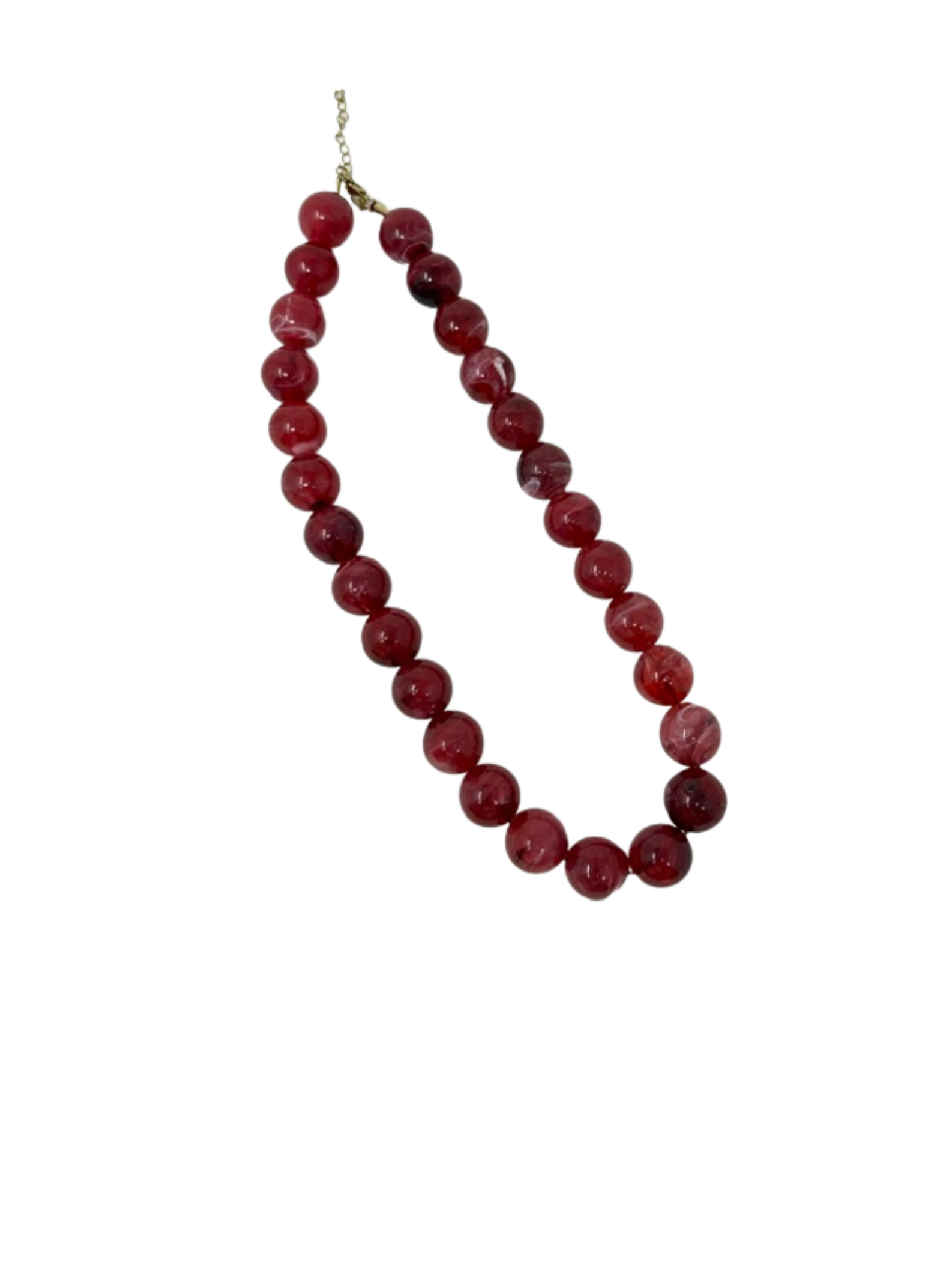 Chunky red marbled bead statement necklace with an adjustable gold chain clasp.