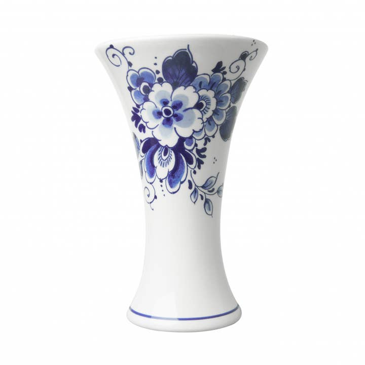 White ceramic chalice vase with blue floral pattern and flared rim. 6.9 inches tall.