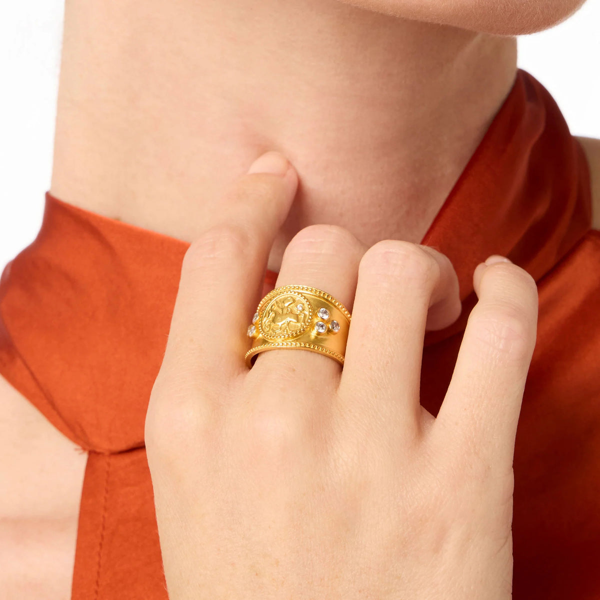Coin Crest Ring in gold plate featuring a bas relief knight on horseback with trefoils and cubic zirconia accents.