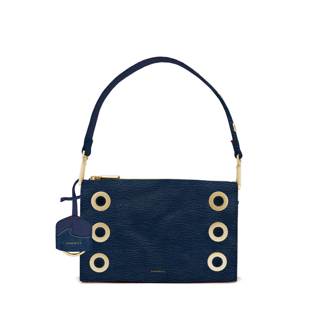Small Montana Revival clutch in vintage Hammitt leather with magnetic closure, red base reveal, and detachable crossbody strap.