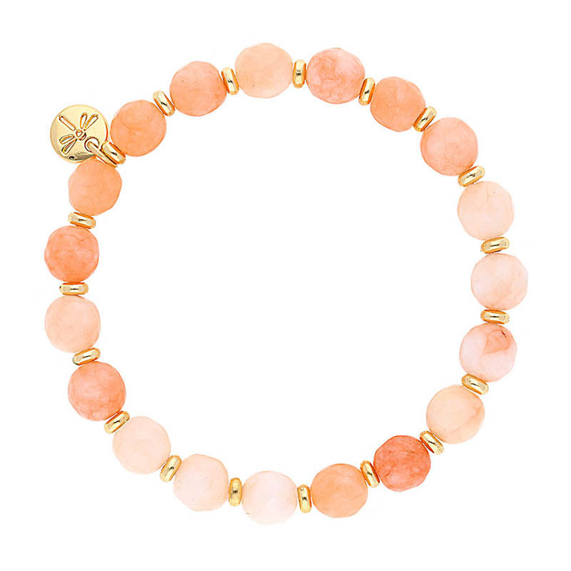 Lizas Beaumont Natural Bracelet featuring peach-toned stone beads and gold-tone spacers and charm.