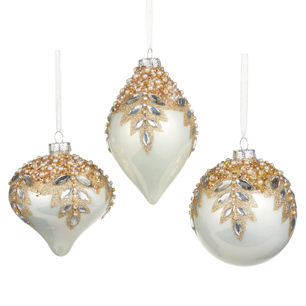 Three white glass ornaments with gold glitter, pearls, and clear gems in various shapes.
