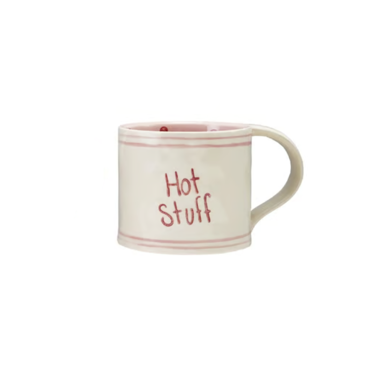 Hand-painted stoneware mug in cream with pink stripes and "Hot Stuff" written in red.