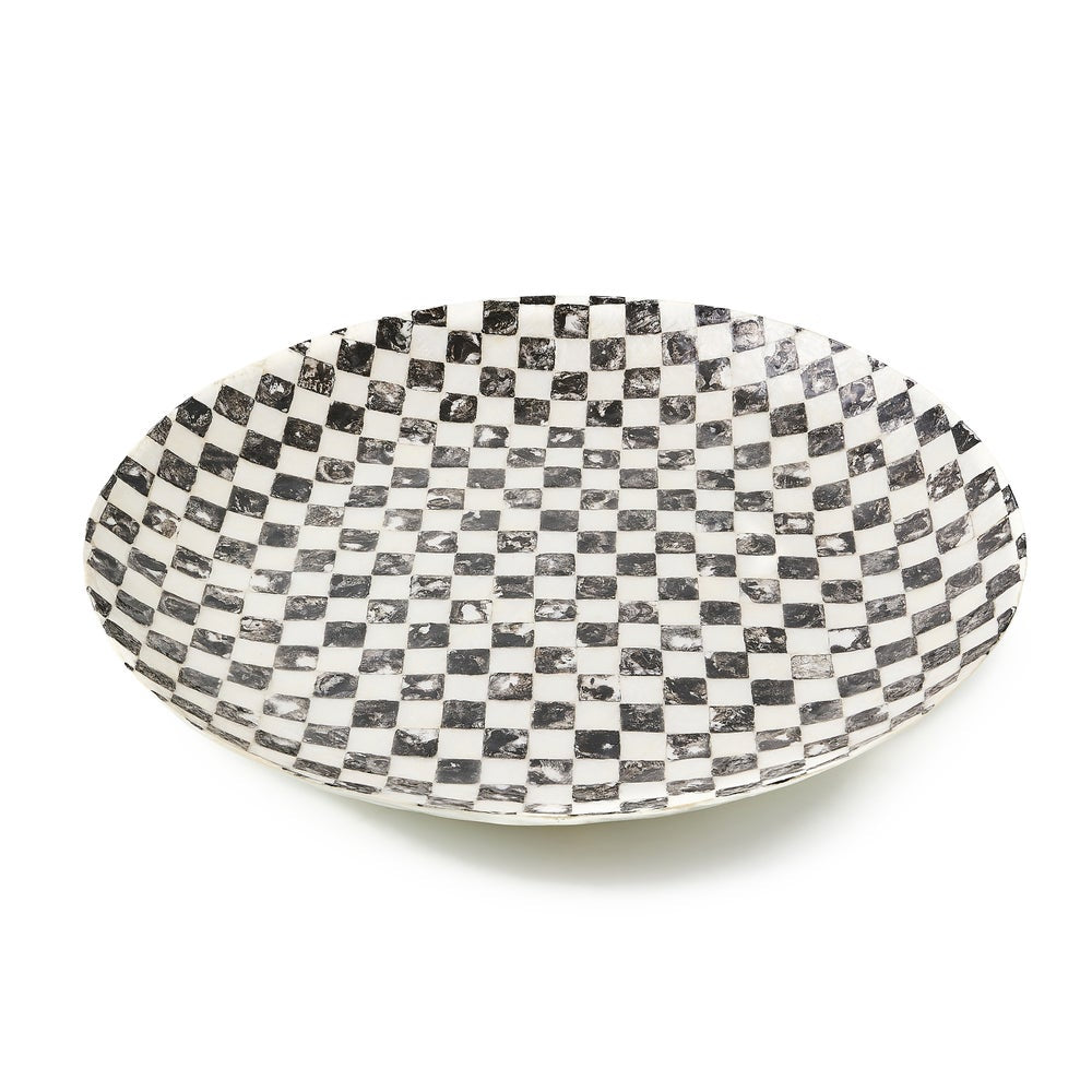 Round capiz decorative bowl with a black and white hand-painted checkered pattern.