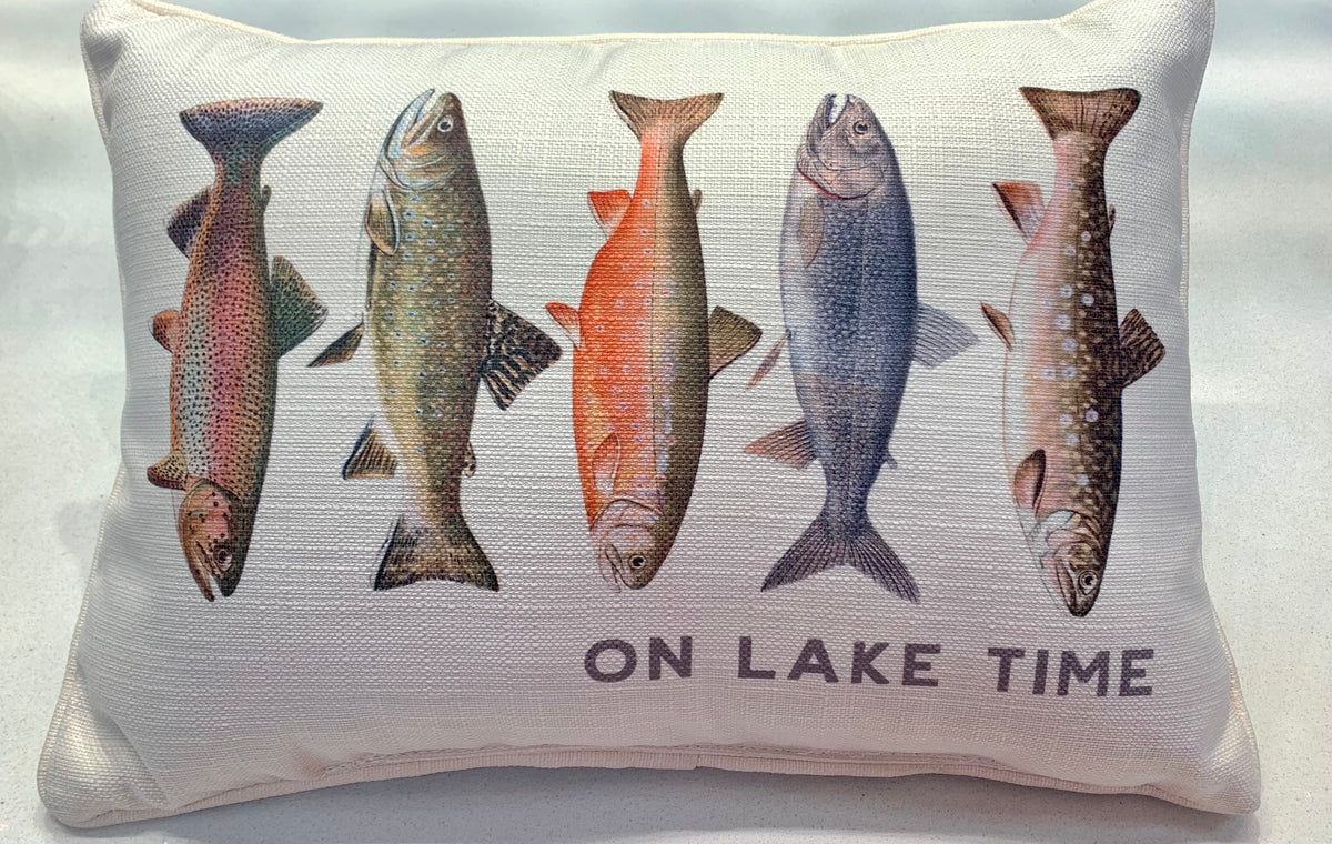 Rectangular cream pillow featuring five illustrated trout and the text "ON LAKE TIME".