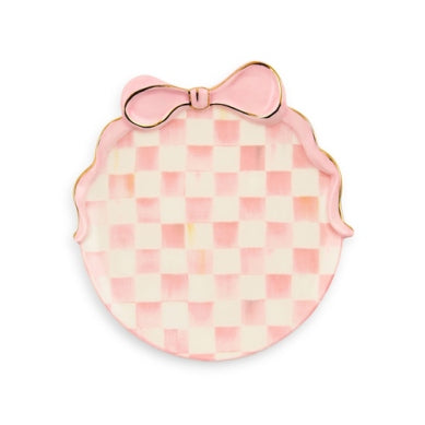 Hand-painted ceramic trinket dish with a decorative bow handle in earthy tones.