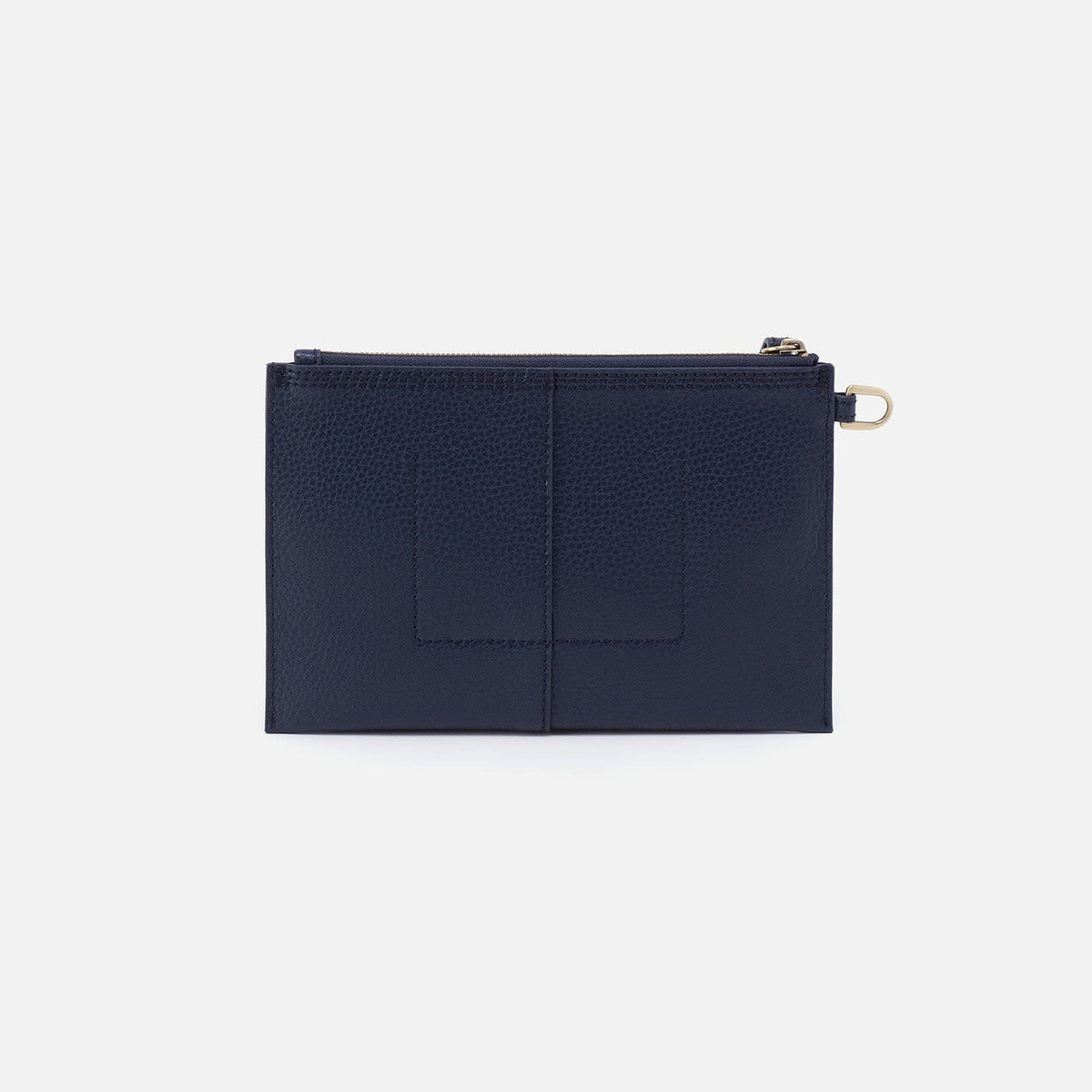 Indigo suede Vida small pouch with coconut shell interior, brass hardware, zip closure, and leather wrist strap.