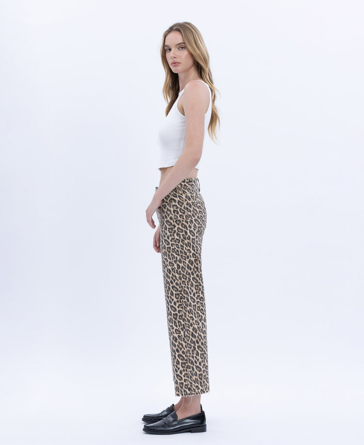 Women's high-rise animal print wide-leg crop jeans with raw hem in stretch denim.