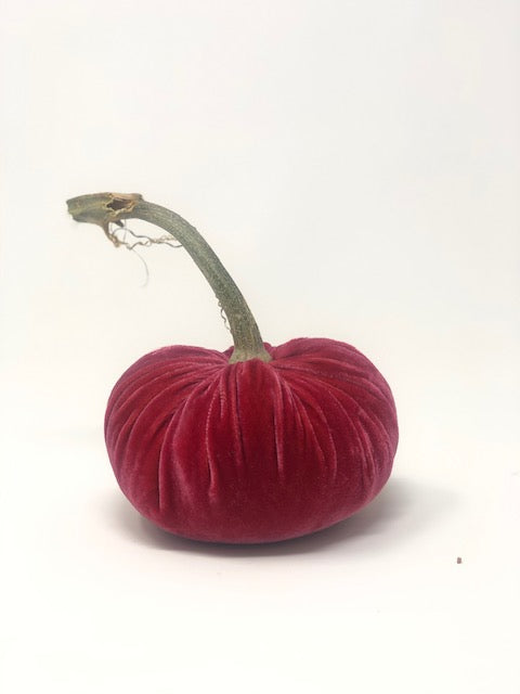 Handmade orange velvet pumpkin with a natural stem.