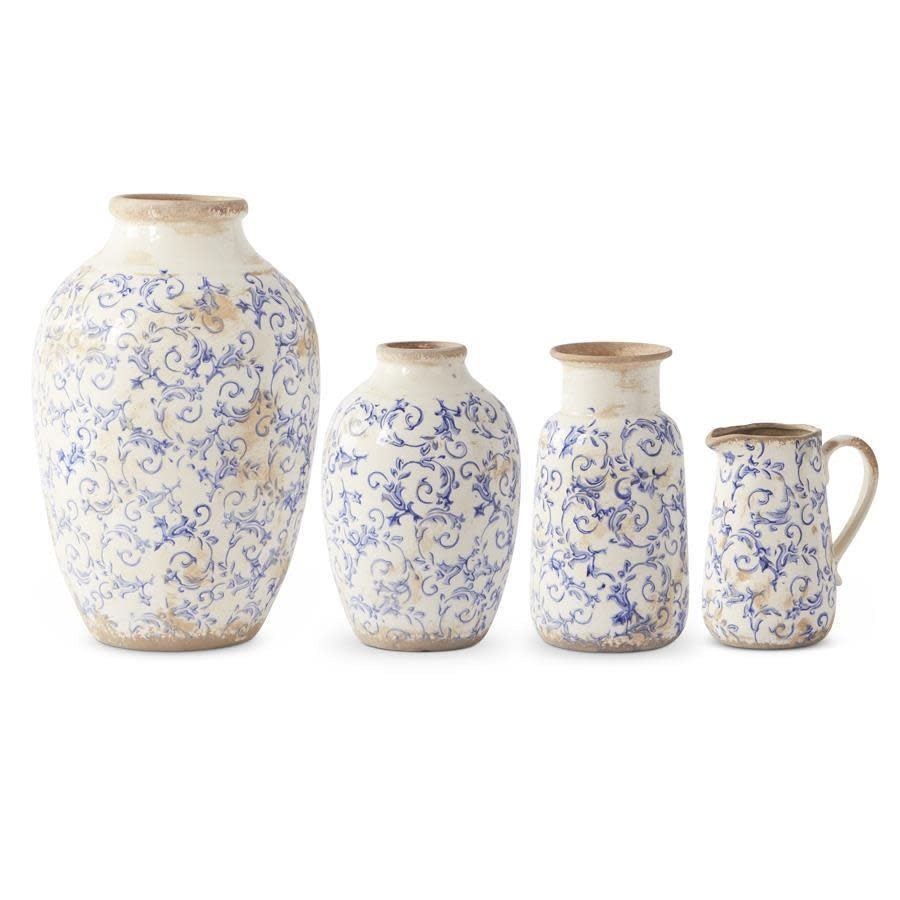 Vintage blue and white ceramic vase with intricate patterns on a classic silhouette.