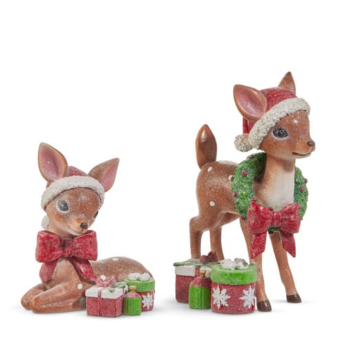 Resin vintage deer figurine with a classic holiday silhouette in neutral tones.