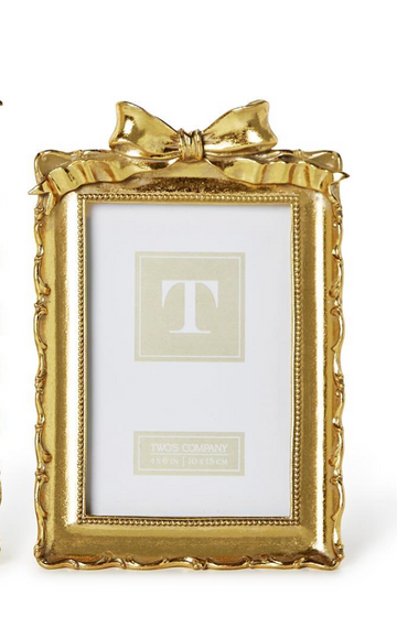 Vintage gold resin picture frame with accent bow detail