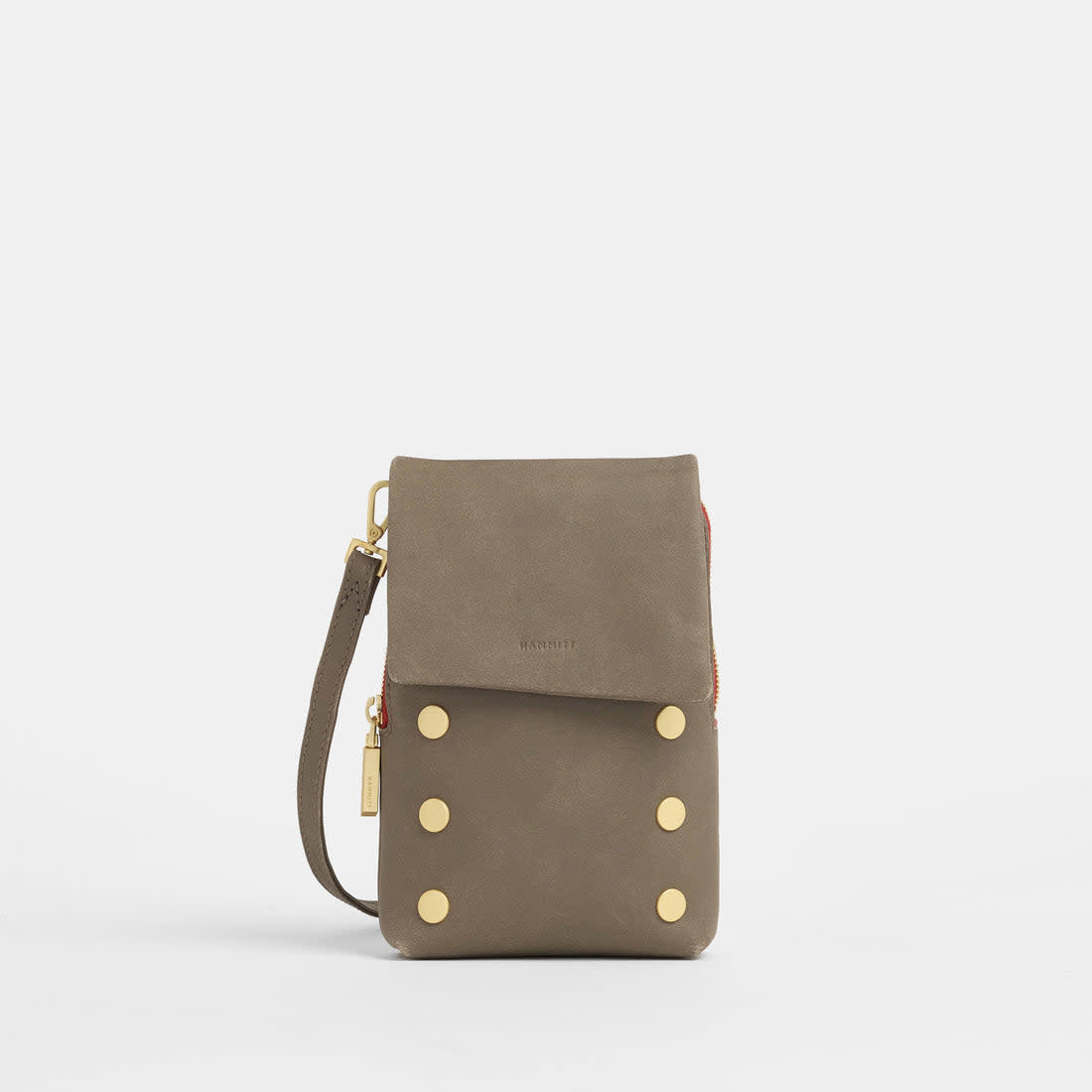 Pewter brushed gold crossbody bag with red zipper accent