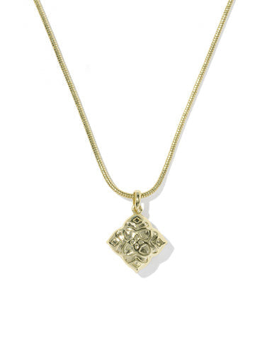 Gold Dira Pearl Short Pendant Necklace featuring a textured medallion logo on a snake chain.