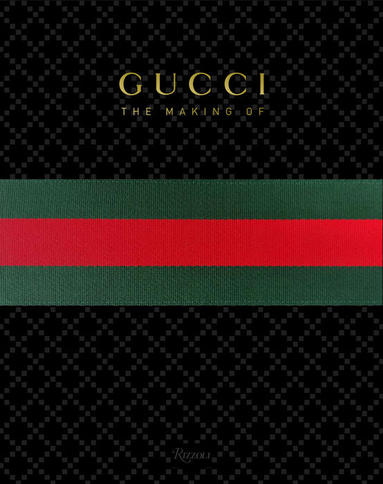 Gucci: The Making Of book cover with black patterned background and green and red striped ribbon.