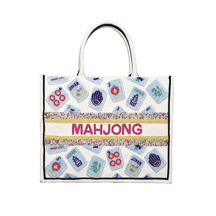 Blue beaded tote bag with a rectangular silhouette featuring gusseted sides.