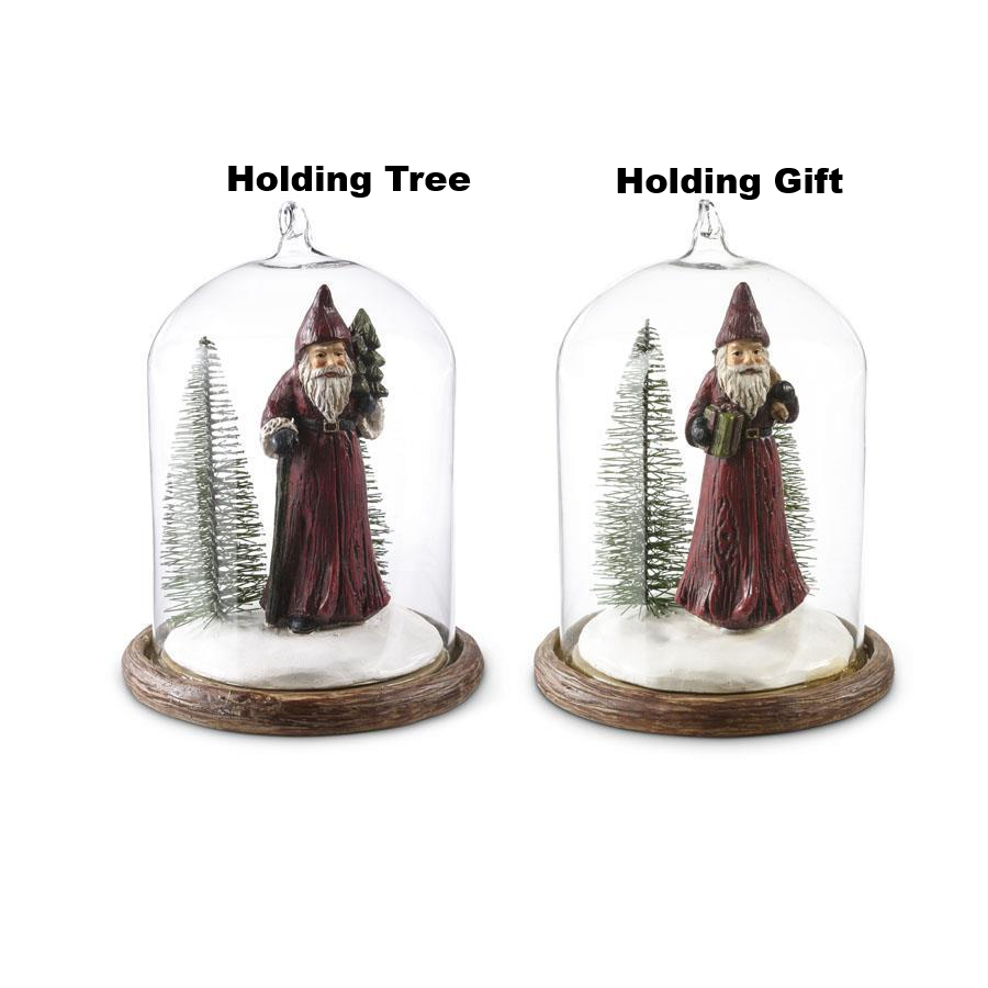 Two glass cloche ornaments featuring a resin Santa and bottlebrush tree on a wooden base.