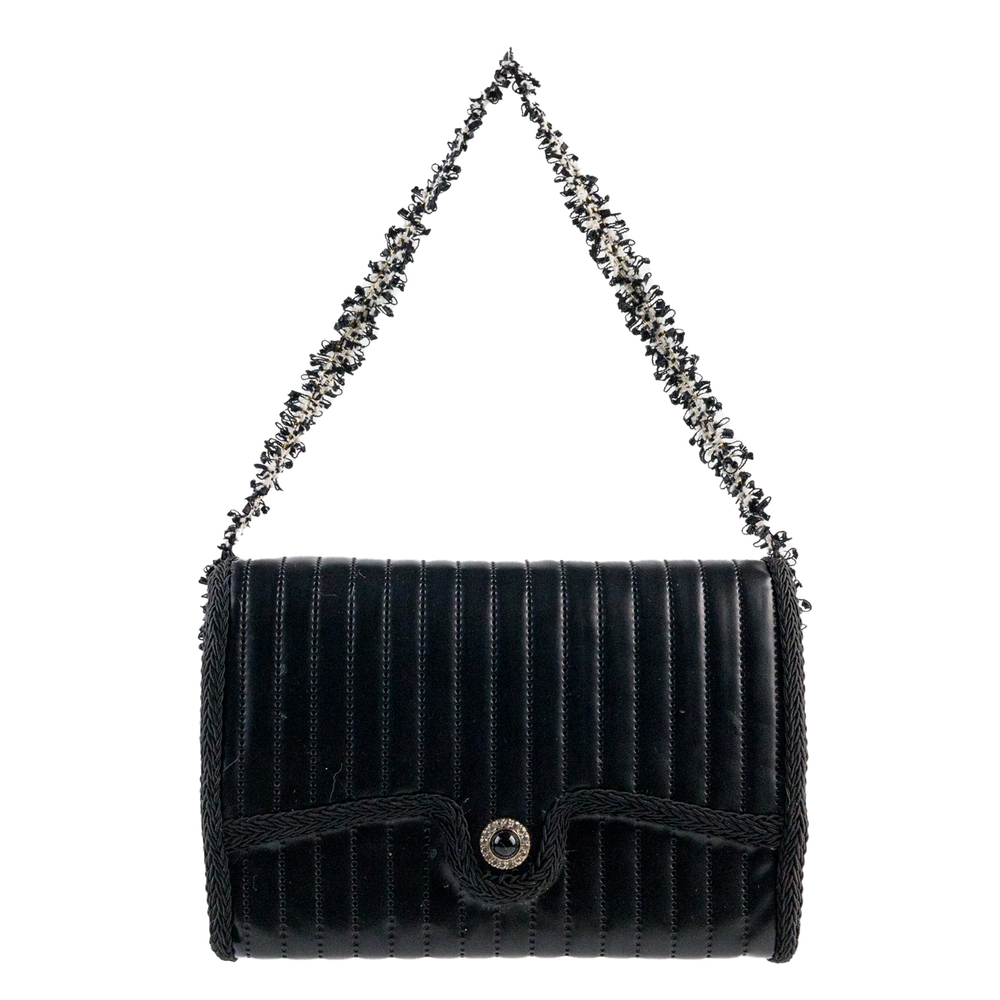 5.5-inch black quilted purse ornament with a decorative strap and jeweled button closure.