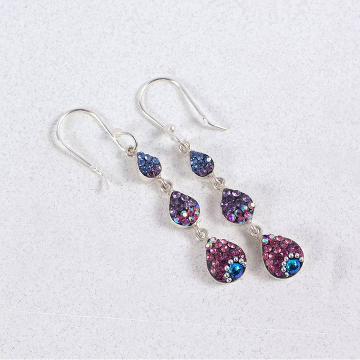 Sterling silver petite cascade earrings featuring dangling Austrian crystals in a teardrop silhouette.