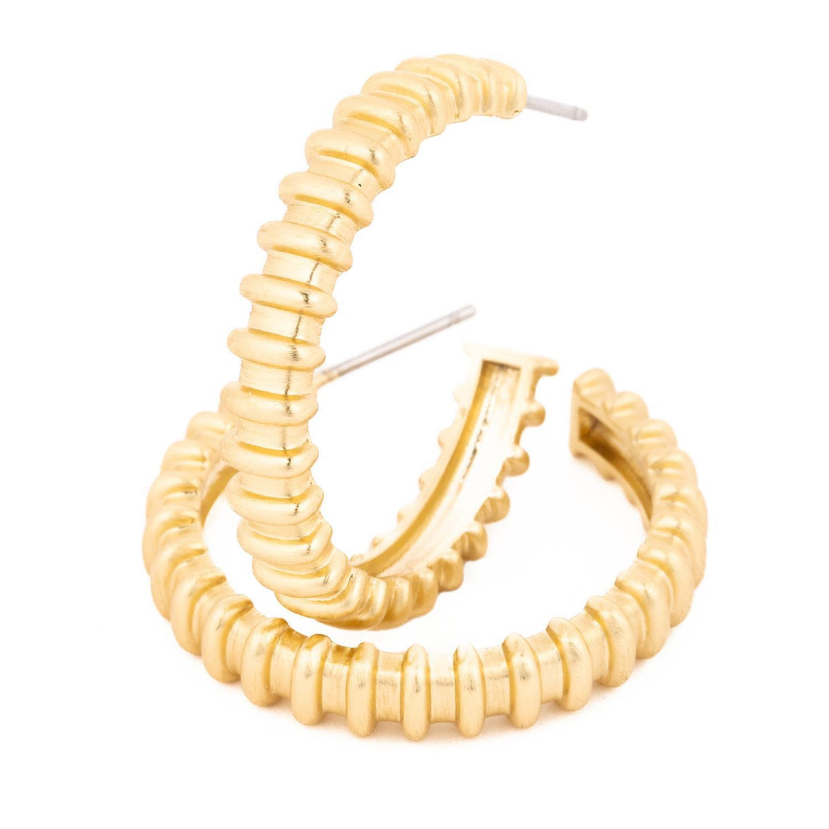 Gold Adeline earrings featuring a delicate chain link with dangling teardrop stones.