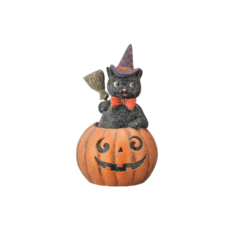 10.5-inch paper pulp black cat with a witch hat and broom sitting inside a carved pumpkin.