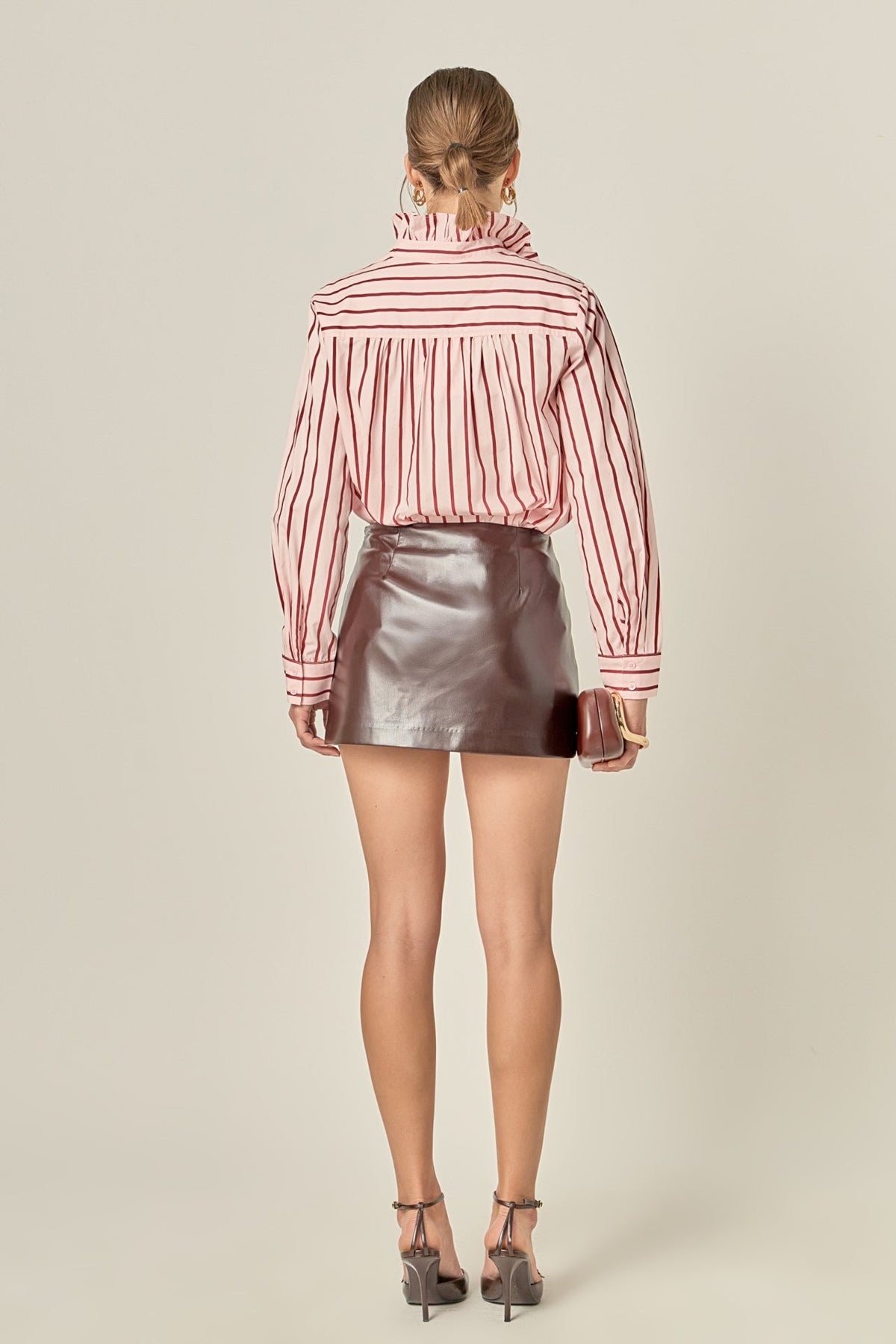 Leah ruffled stripe button-up shirt in white cotton with long sleeves, front buttons, and back yoke shirring.