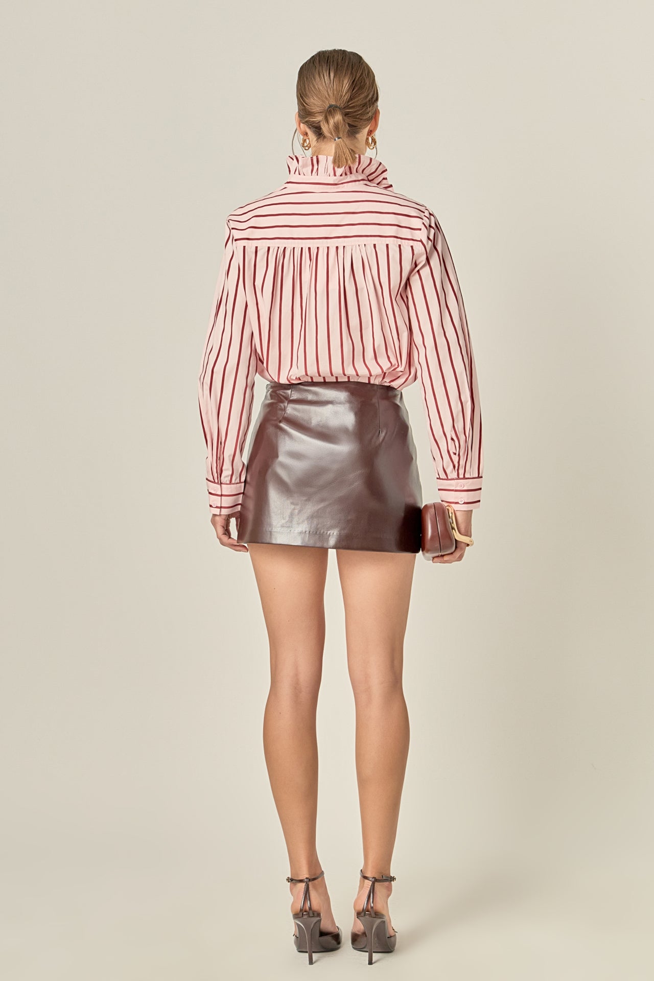 Leah ruffled stripe button-up shirt in white cotton with long sleeves, front buttons, and back yoke shirring.