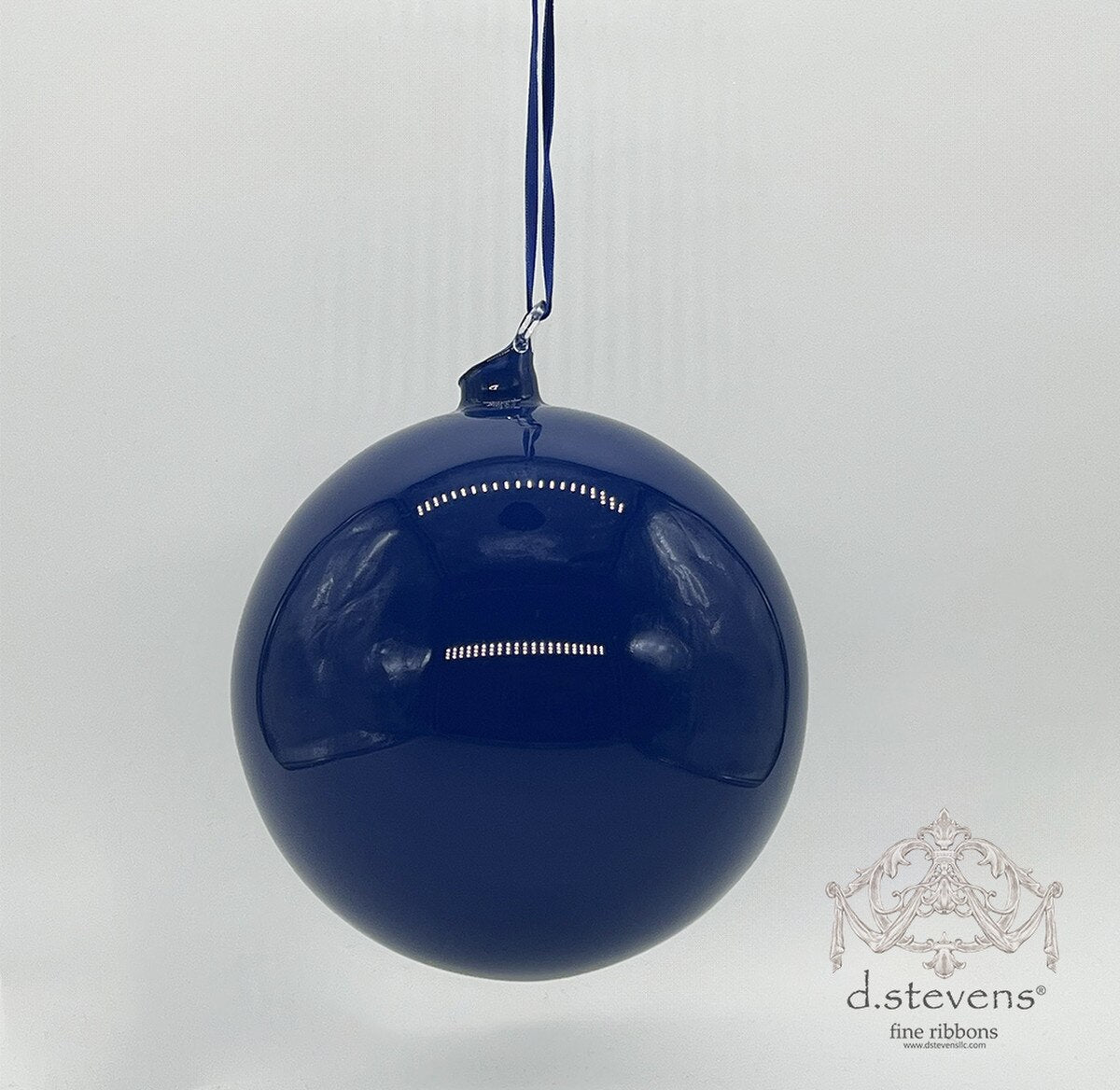 150mm hand-blown cobalt blue glass orb ornament with a hanging ribbon.