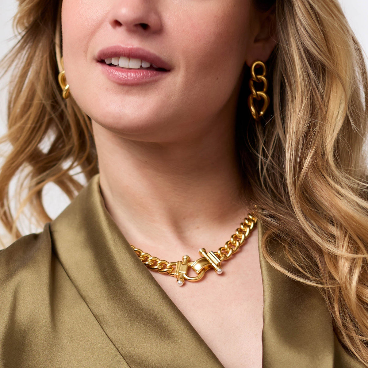 Woman wearing a Dolce Demi Link Necklace in 24K gold plate with glass pearl accents.