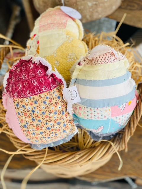 Vintage fabric Easter egg measuring 7x9 inches with a quilted pattern.