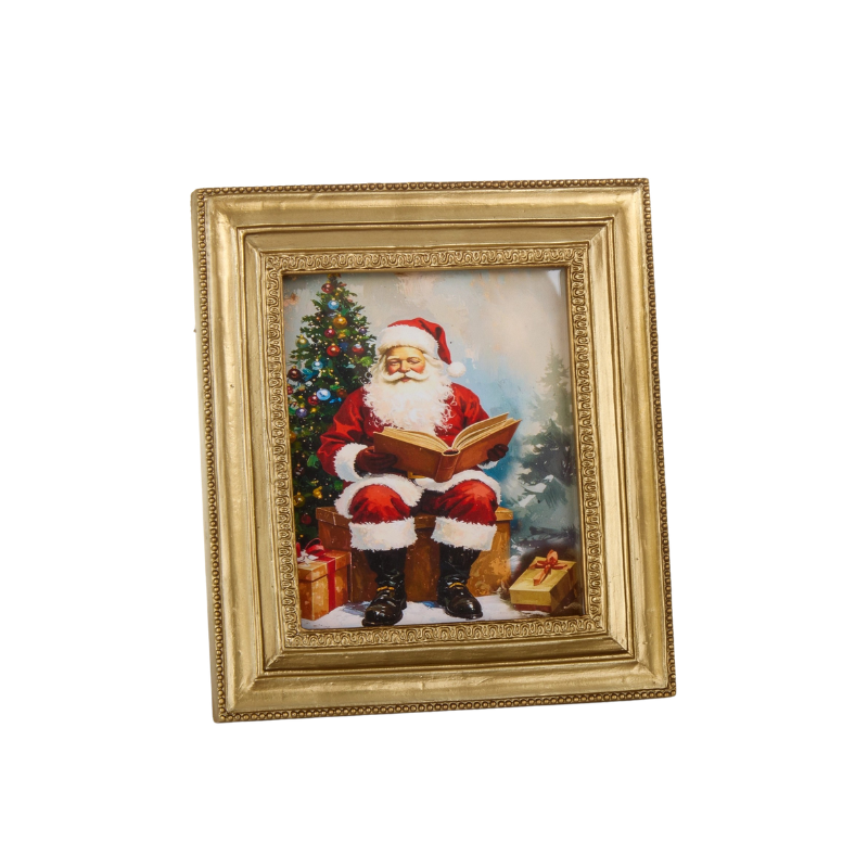 5.75-inch mini gold framed print of Santa Claus reading a book by a Christmas tree.