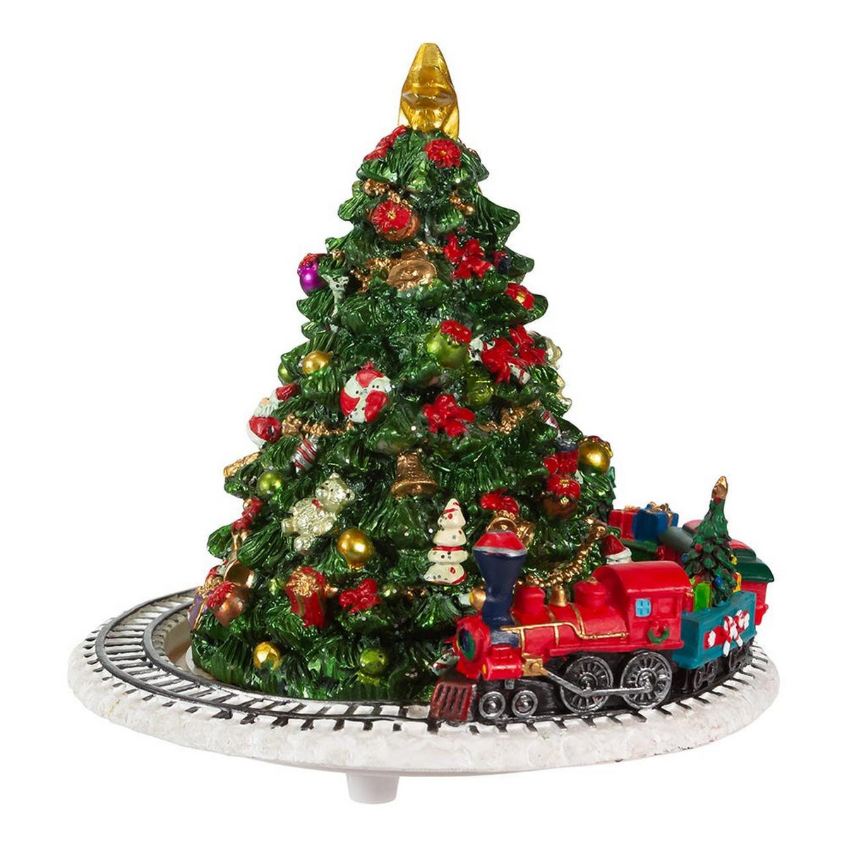 Christmas tree music box with a red revolving train on a track base and a gold star topper.