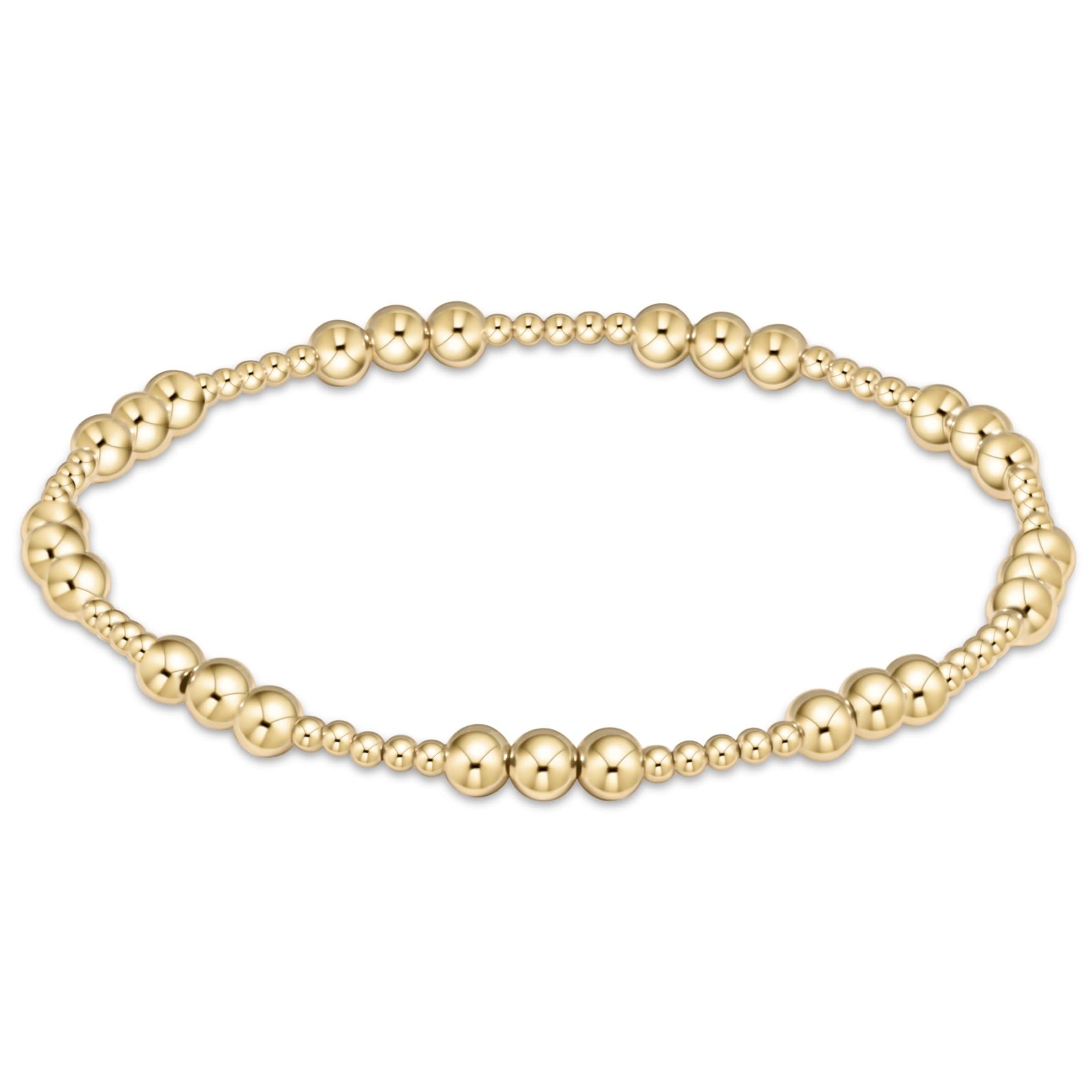 Gold-filled classic joy bead bracelet with mixed 4mm and 2mm beads on stretch elastic cord