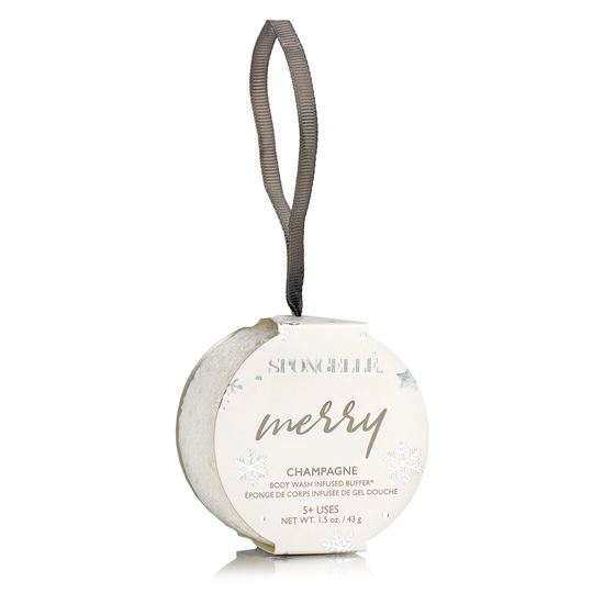 Champagne Holiday Ornament Buffer in orange with floral musk scent