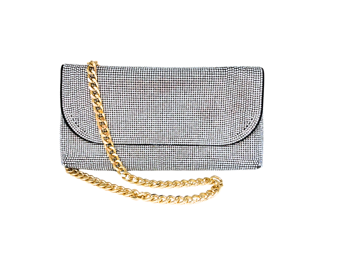 A rectangular clutch covered in silver rhinestones with a chunky gold chain strap.