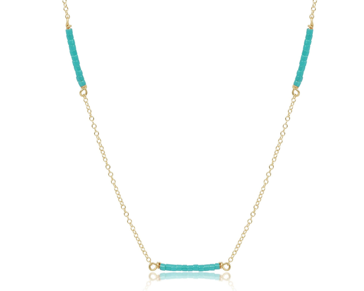 15-inch gold-filled choker chain featuring three sections of turquoise seed beads.
