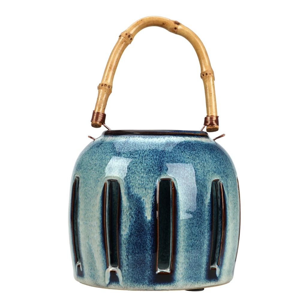 Ceramic lantern with bamboo handle in neutral tones